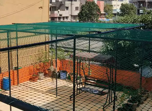 Terrace top protected with perimeter safety netting
