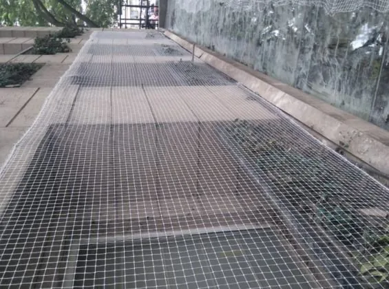 Protective net covering a building duct area