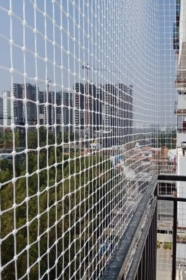 Protective netting across an apartment opening