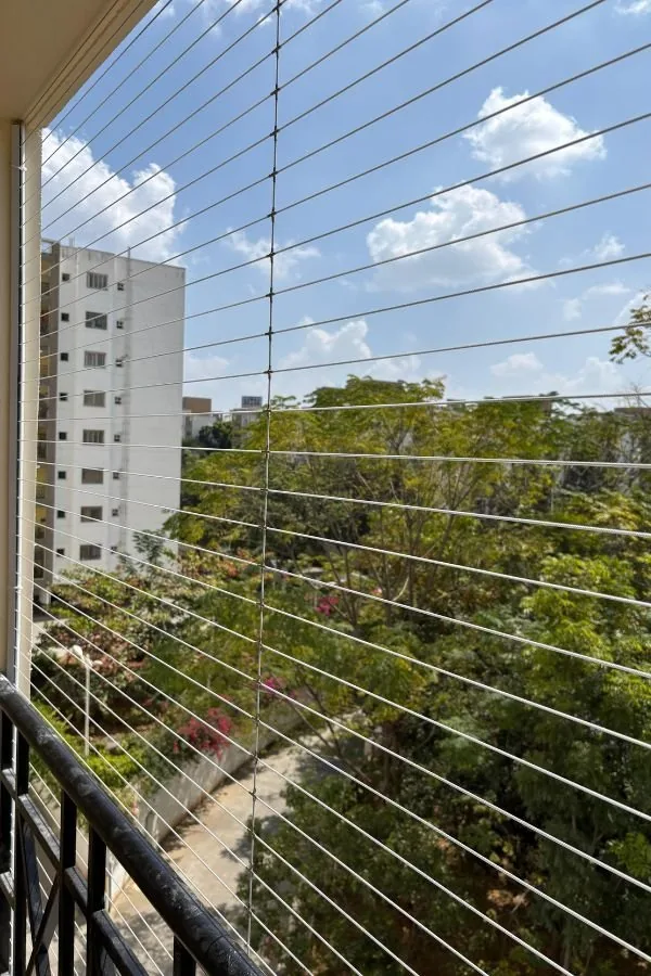Safety net installation in a tall residential space